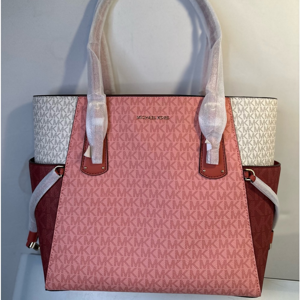 Make:Michael Kors Brand New without tags multi color handbag